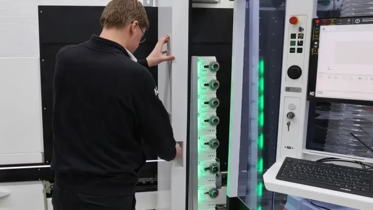 The tool changer on the inside of the access door offers 8 slots